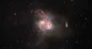 Столкновение двух галактик в новом изображении Хаббла