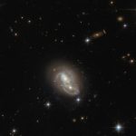 Хаббл запечатлел столкновение двух спиральных галактик